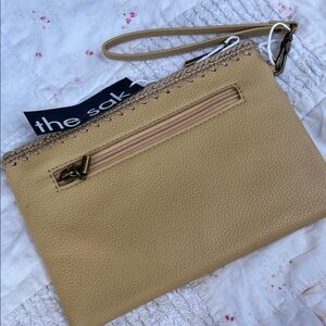 The Sak Genuine Leather Wristlet w Crochet Trim